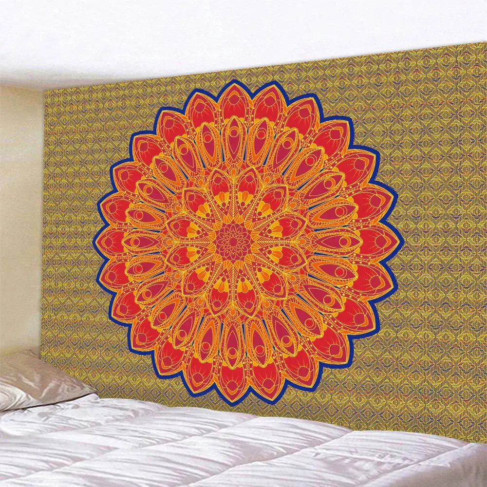 Vibrant orange and red indian mandala psychedelic tapestry with bold blue outline hanging on gold-patterned wall decorbites decor
