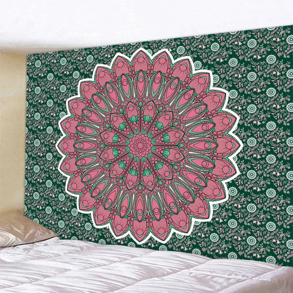 A vibrant pink and green indian mandala psychedelic tapestry with intricate floral patterns hanging above a bed decorbites indian mandala