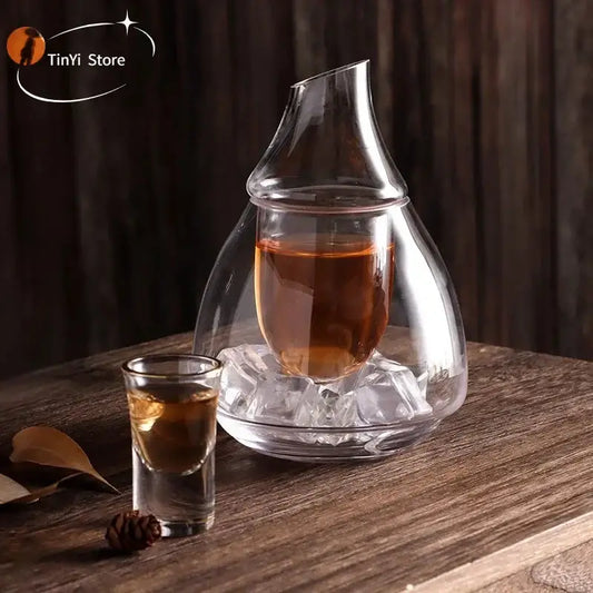 Clear glass wine pot with a sleek teardrop design and narrow spout for dining room and bar use