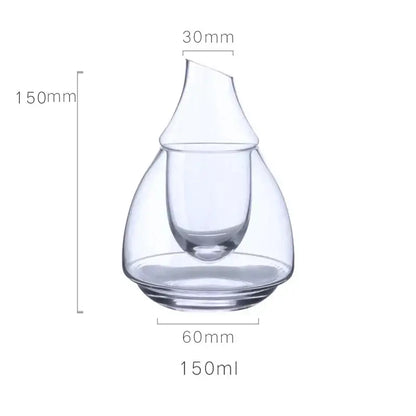 Clear glass wine pot with a sleek teardrop shape and integrated pouring spout for dining room and bar use