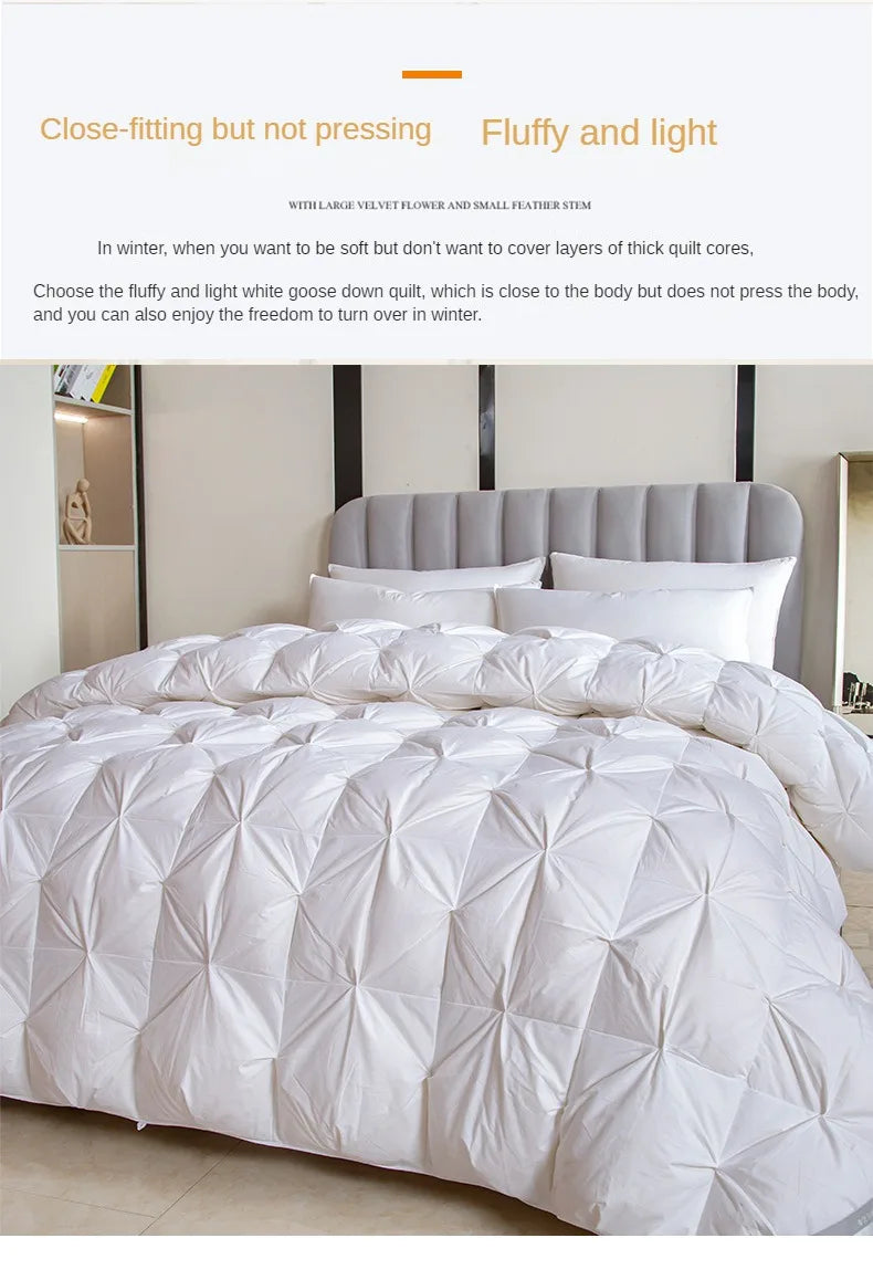 White goose down quilt with plush diamond quilted design and thickened core for warmth and comfort