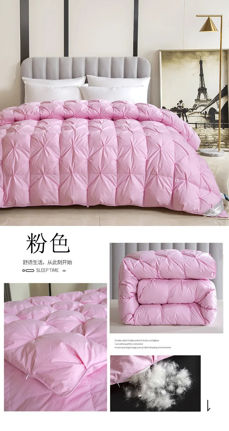 Pink quilted temperature controlled down quilt with white goose down and diamond stitching for warmth and comfort