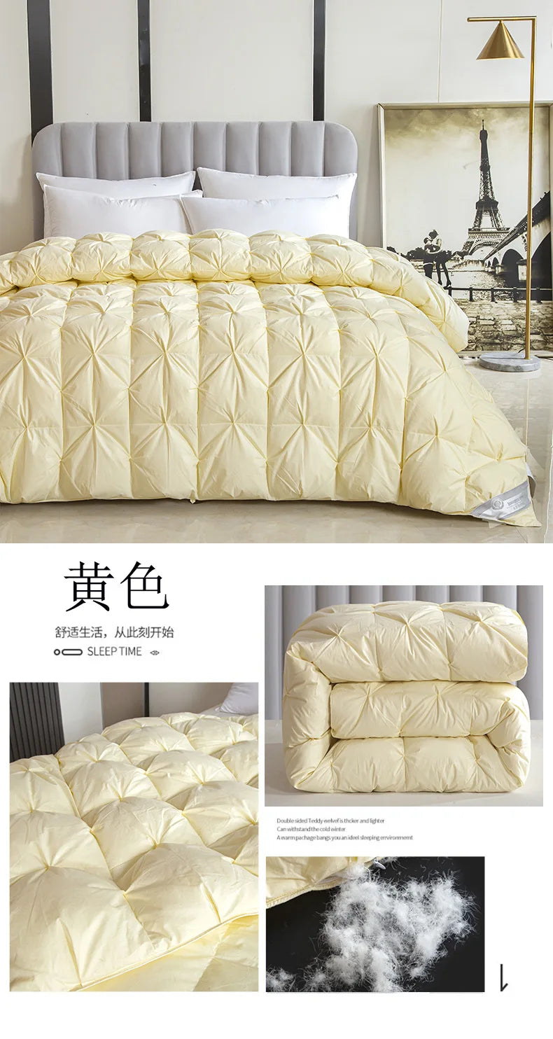 A soft pale yellow temperature controlled down quilt with diamond stitching and white goose down for warmth and comfort