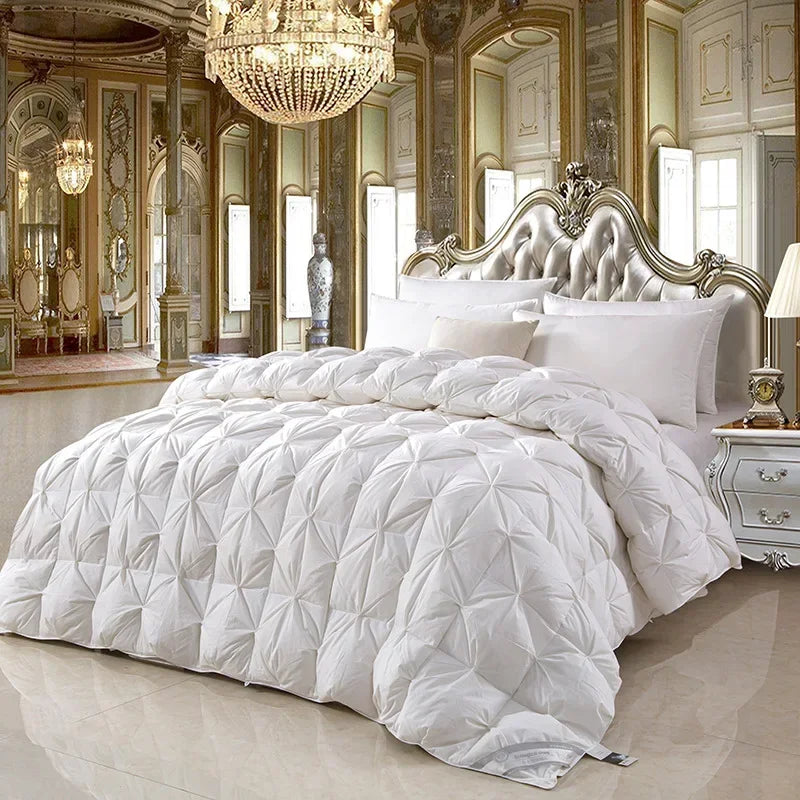 White quilted comforter with diamond pattern made of white goose down for temperature controlled warmth and comfort