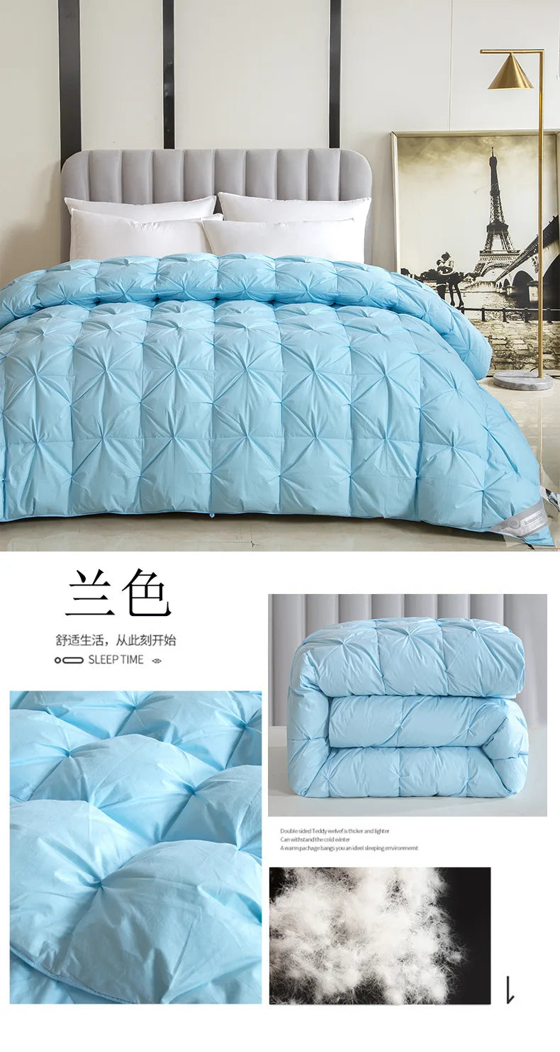 Temperature controlled light blue quilt with diamond stitching and thickened core filled with white goose down for warmth