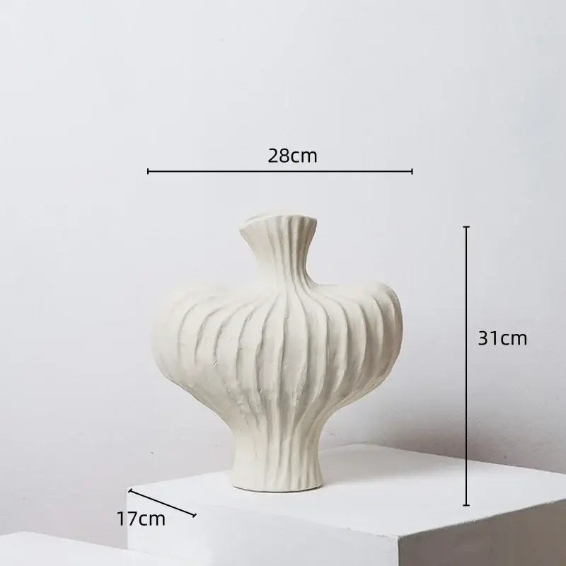 White ceramic fringe heterophore vase with vertical ridges and flared neck 28cm wide by 31cm tall for living room decor