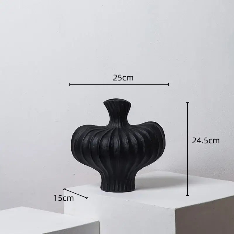 Black ceramic fringe heterophore vase with ribbed organic curves and flared neck for living room decorbites decor