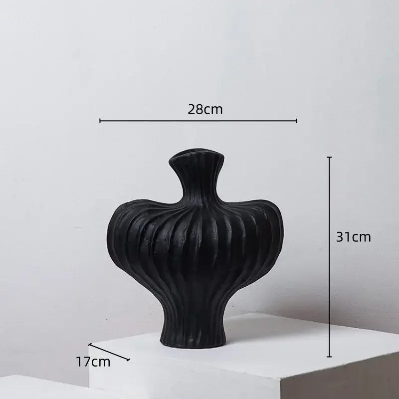 Black ceramic fringe heterophore vase with ribbed organic curves and flared neck for living room decorbites fringe heterophore