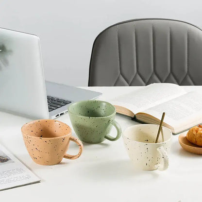 Three speckled ceramic mugs in terracotta sage green and off-white from decorbites creative ceramic espresso cup set