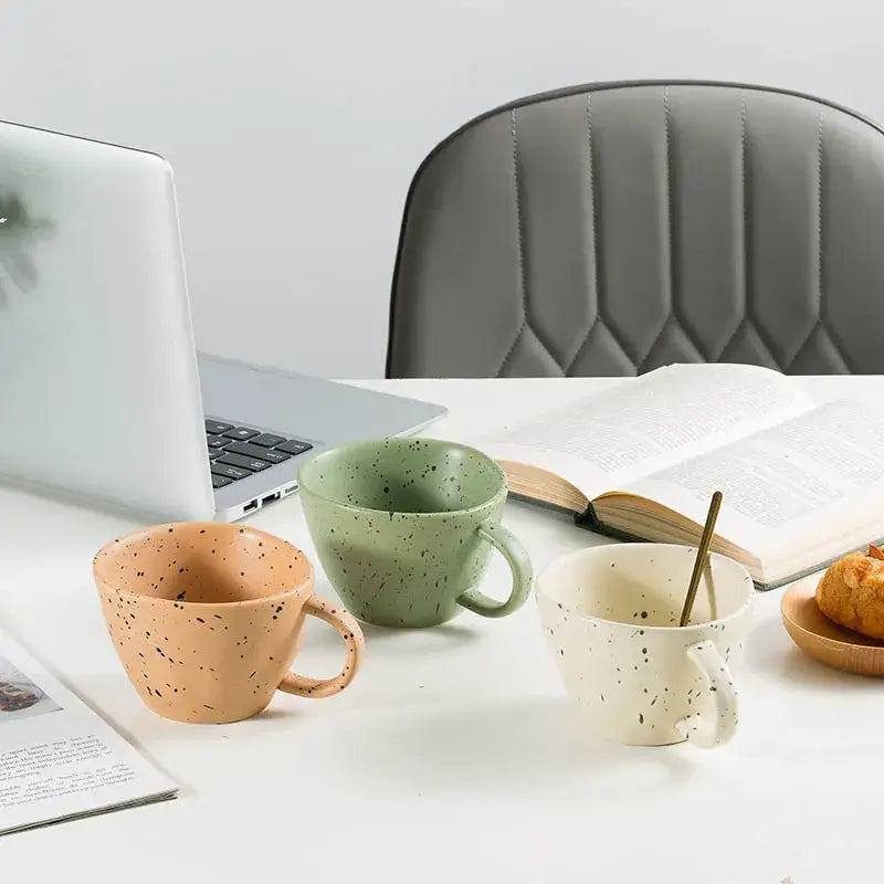 Three speckled ceramic mugs in terracotta sage green and off-white from decorbites creative ceramic espresso cup set