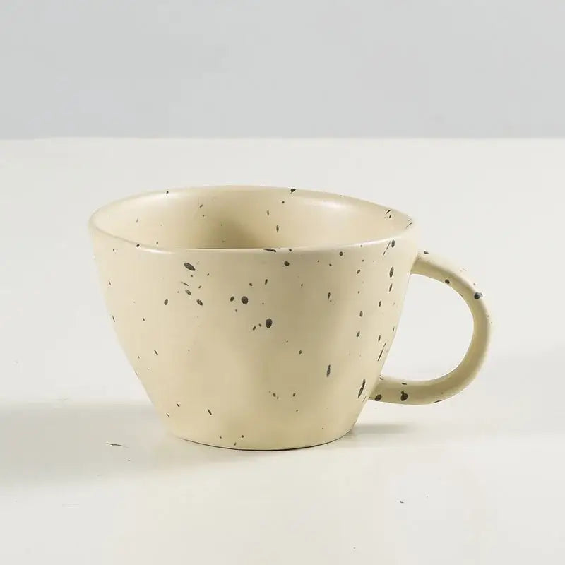 Cream-colored terracotta speckled creative ceramic espresso cup from decorbites cup set for dining room use