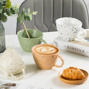 Terracotta speckled creative ceramic espresso cup set featuring a warm glaze and black dots ideal for dining room decorbites creative ceramic