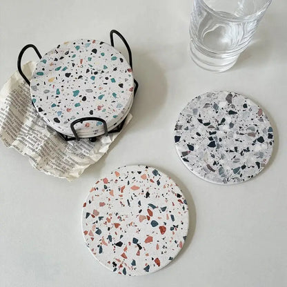 Terrazzo decorbites diatomite coasters set of 4 white circular mugs mats with teal black and terracotta speckles