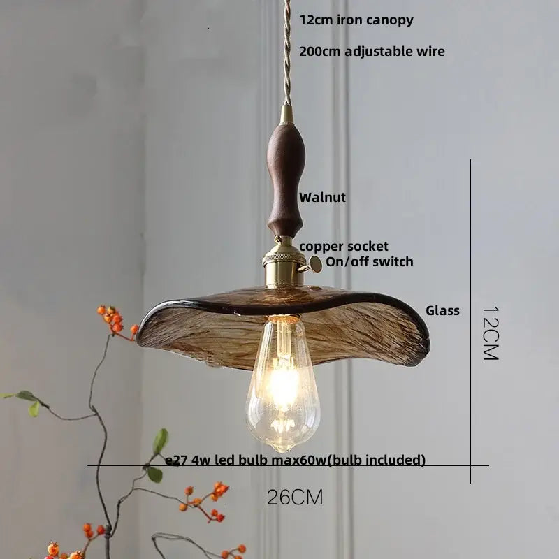 Rustic pendant light with dark walnut wood canopy and decorbites amber glass textured shade for dining room kitchen