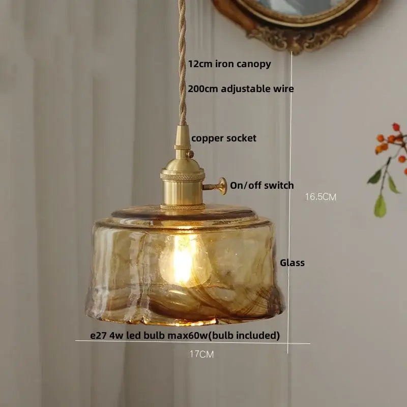 Textured amber glass pendant light with brass-finished copper socket and adjustable iron canopy for dining room decorbites amber glass pendant