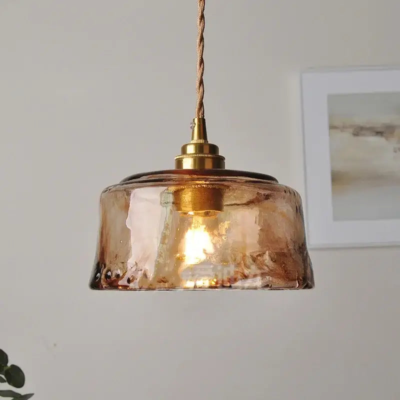 Textured amber glass pendant light with brass fixture and twisted cord for dining room kitchen decorbites amber glass