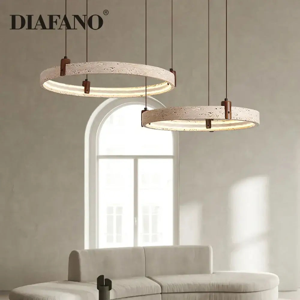 Two circular pendant lights with textured beige cave stone finish and copper accents for living room decorbites chandelier