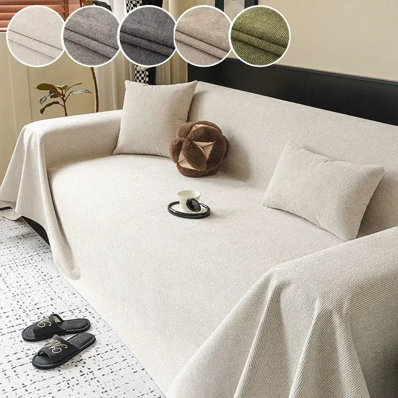 Beige textured fabric sofa cover with subtle woven pattern and anti-slip backing available in neutral tones for living room