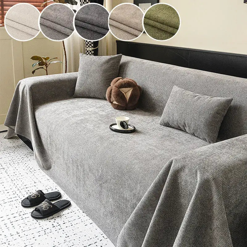 Gray textured fabric sofa cover with anti-slip backing and matching pillows featuring a plush bear decoration