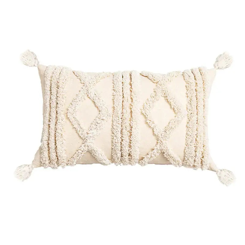 Cream-colored rectangular cushion cover with textured geometric patterns and decorbites beige tassels for living room decor