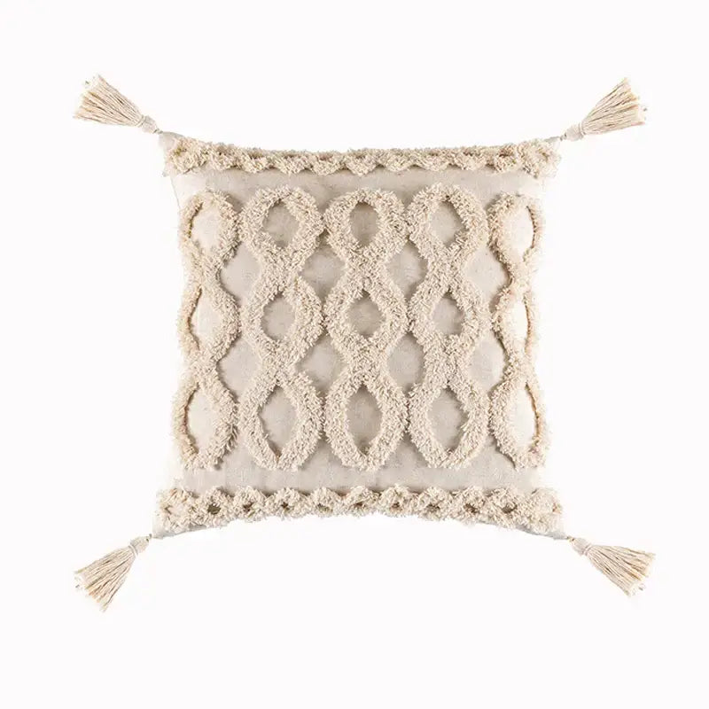 Cream-colored cushion cover with woven diamond pattern and decorbites beige tassels for living room decor