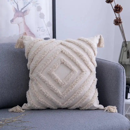 Cream-colored cushion cover with textured diamond pattern and decorbites beige tassels cushion for living room decor