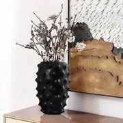 Textured black ceramic flower vase with bumpy surface by decorbites for elegant living room decor