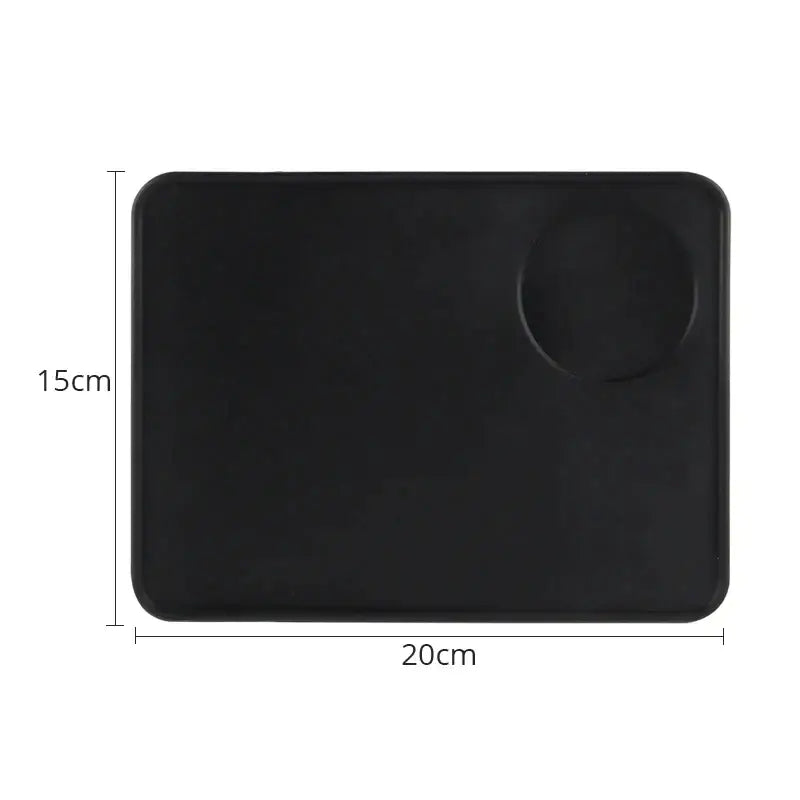 Black rectangular textured espresso distribution tool with rounded corners and circular cutout for precise espresso distribution