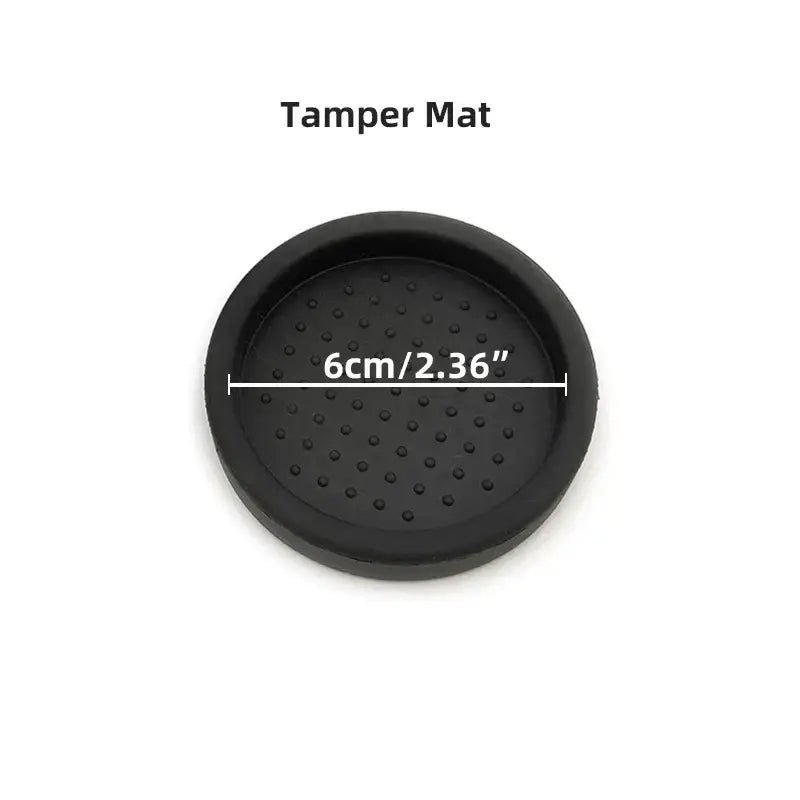 Textured black circular espresso distribution tool tamper mat with raised dots for improved espresso distribution