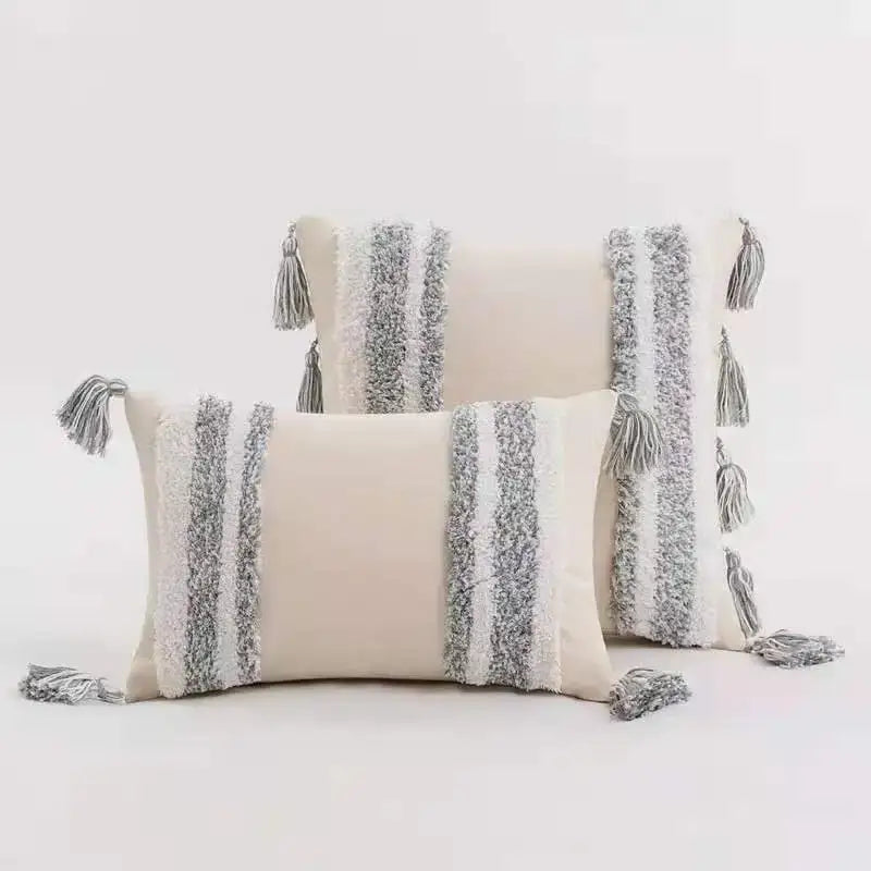Cream-colored rectangular cushion cover with textured silver white fringe stripes and tassels for home decor decorbites blue grey
