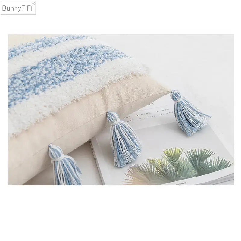Cozy cream cushion cover with soft blue and white stripes and fluffy tassels for home decor decorbites blue grey