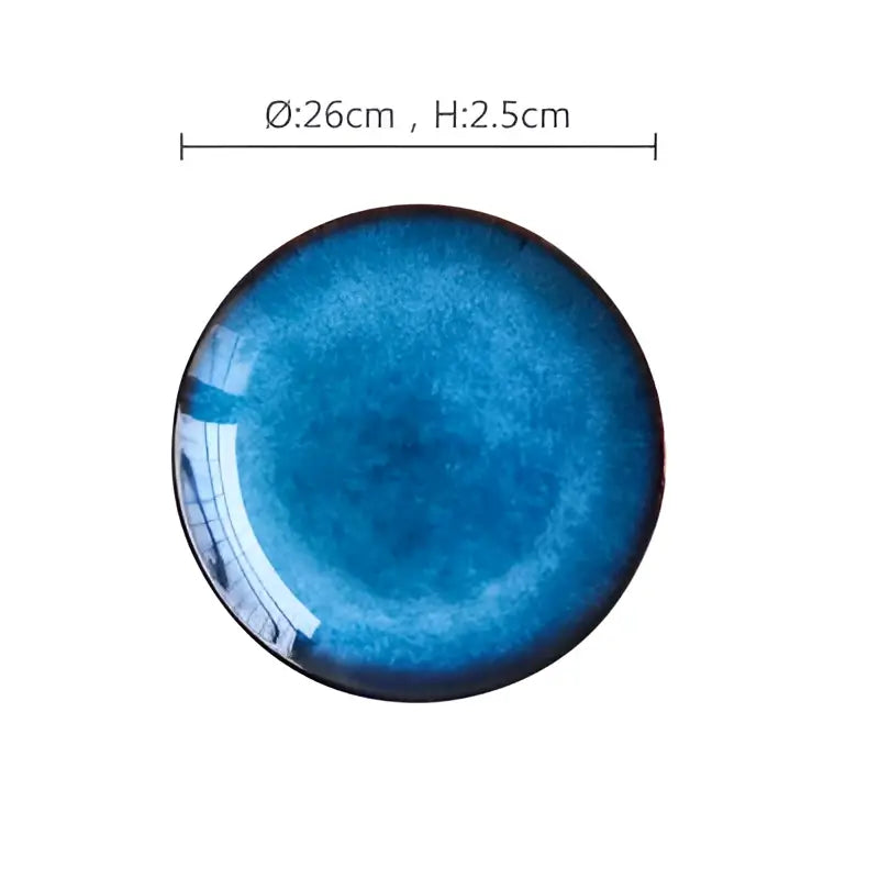 A decorbites ceramic dinner plate with a textured blue gradient glaze, glossy finish, ideal for dining room use