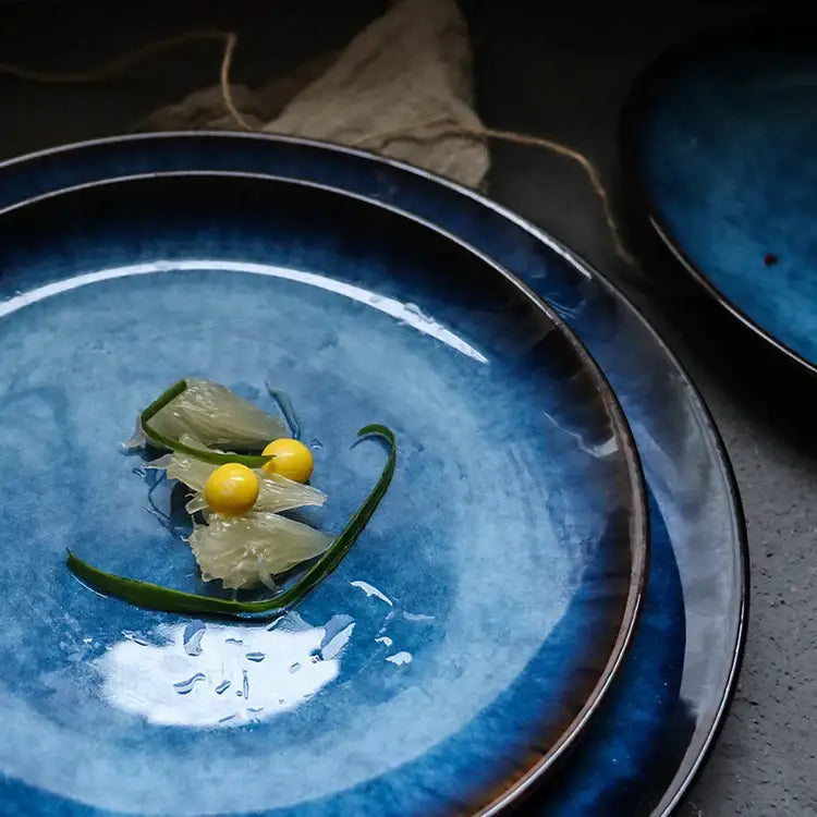 Deep blue ceramic dinner plate with glossy gradient glaze and subtle texture from decorbites dinner plate set