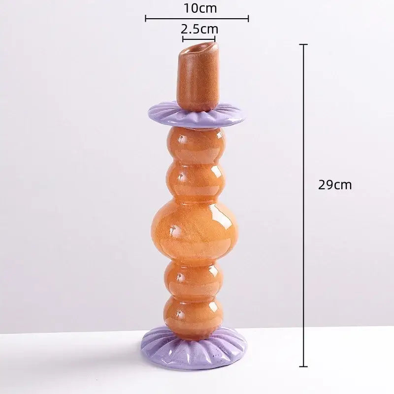 Tall glossy amber glass candlestick holder with lavender ceramic base and top ring for decorbites geometric glass decor