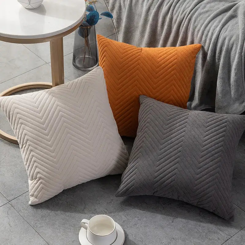 Three square throw pillows with textured chevron quilting in cream orange and gray for decorbites blue wave cushion cover set