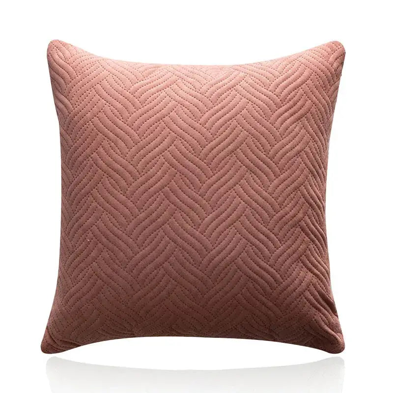 A soft dusty rose cushion cover with a textured herringbone quilted pattern for decorbites blue wave living room decor