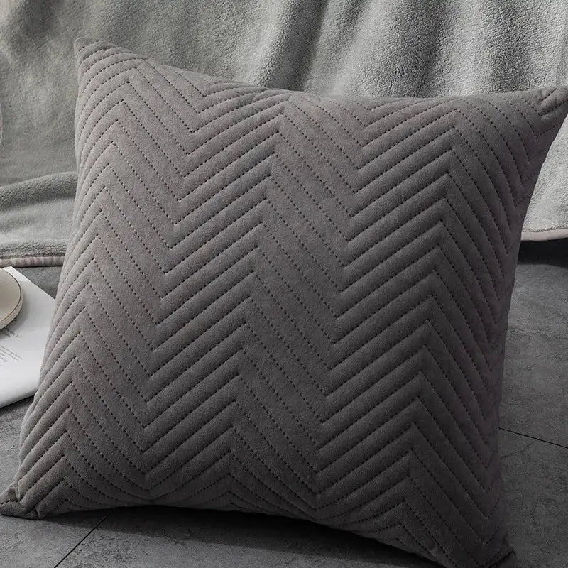 Gray velvet cushion cover with chevron quilted pattern complementing decorbites blue wave living room decor