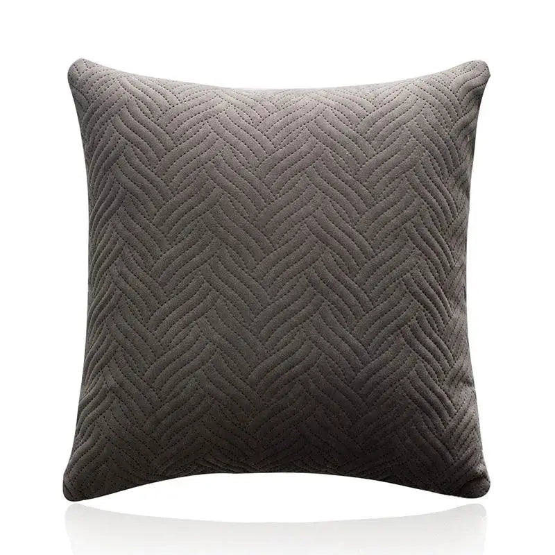 A dark gray square cushion cover with textured herringbone quilted pattern for decorbites blue wave living room decor