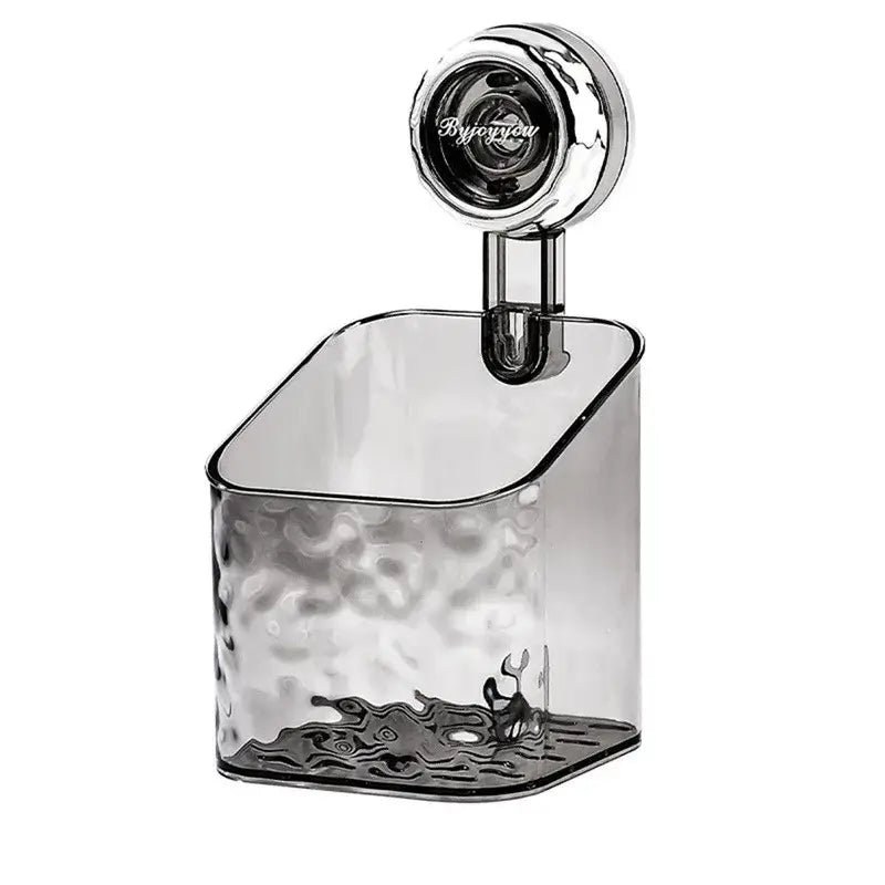 Clear textured glass toothbrush holder with chrome bracket and byjyog logo on a suction cup bathroom shelf storage rack