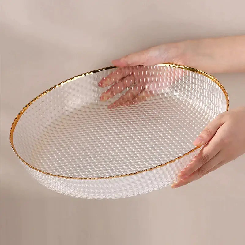 Clear glass fruit plate with textured bubble surface and gold-trimmed edges for living room snack storage plate