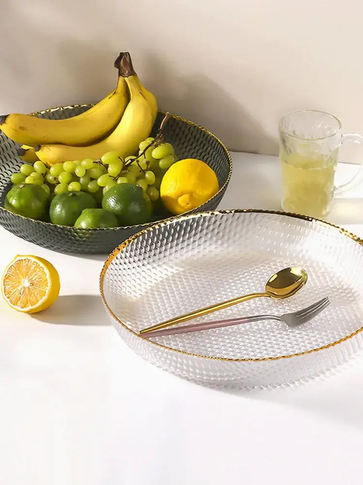 Clear glass fruit plate with textured diamond pattern and gold trim serves as an elegant snack storage plate