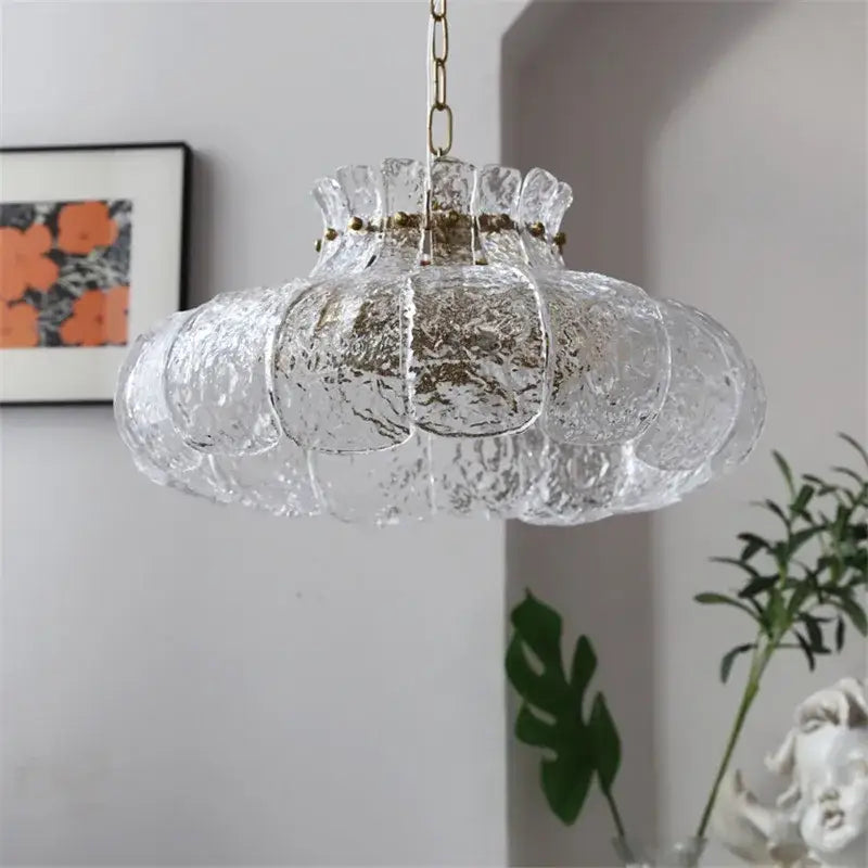 Textured clear glass french pendant chandelier with gold-toned metal chain for elegant dining room lighting