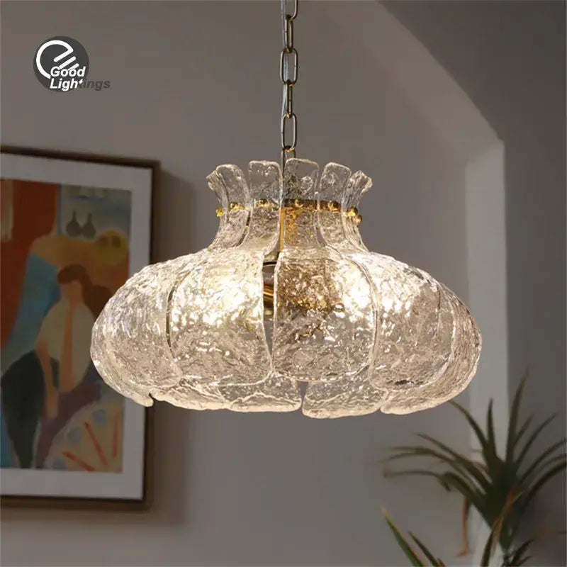 Clear textured glass french pendant chandelier with gold-toned frame and chain for dining room lighting