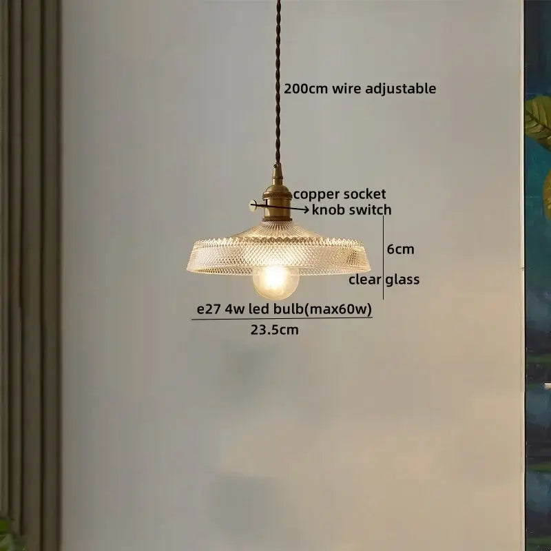 Antique brass-finished pendant light with clear textured glass led shade and exposed bulb for kitchen decorbites clear glass