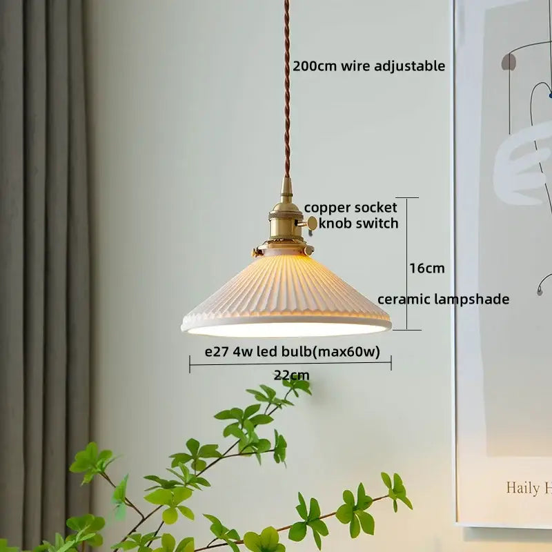 A vintage-style ceramic pendant light with a fluted off-white shade and copper fittings for decorbites clear glass led use