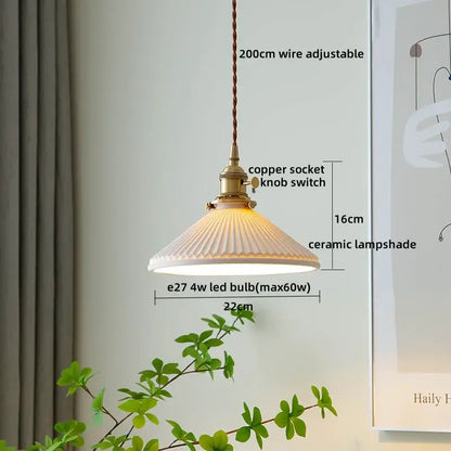 A vintage-style ceramic pendant light with a fluted off-white shade and copper fittings for decorbites clear glass led use