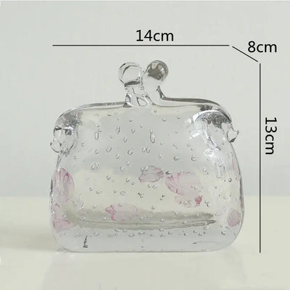 Clear glass clutch with pink cherry blossom patterns and bubbles featuring a silver clasp for decorbites clear glass use