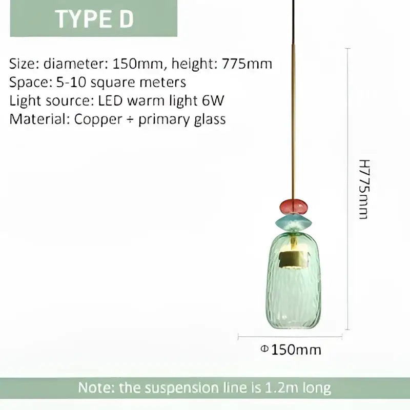 A delicate teal glass pendant light with copper accent and warm led bulb for modern kitchen and dining room interiors
