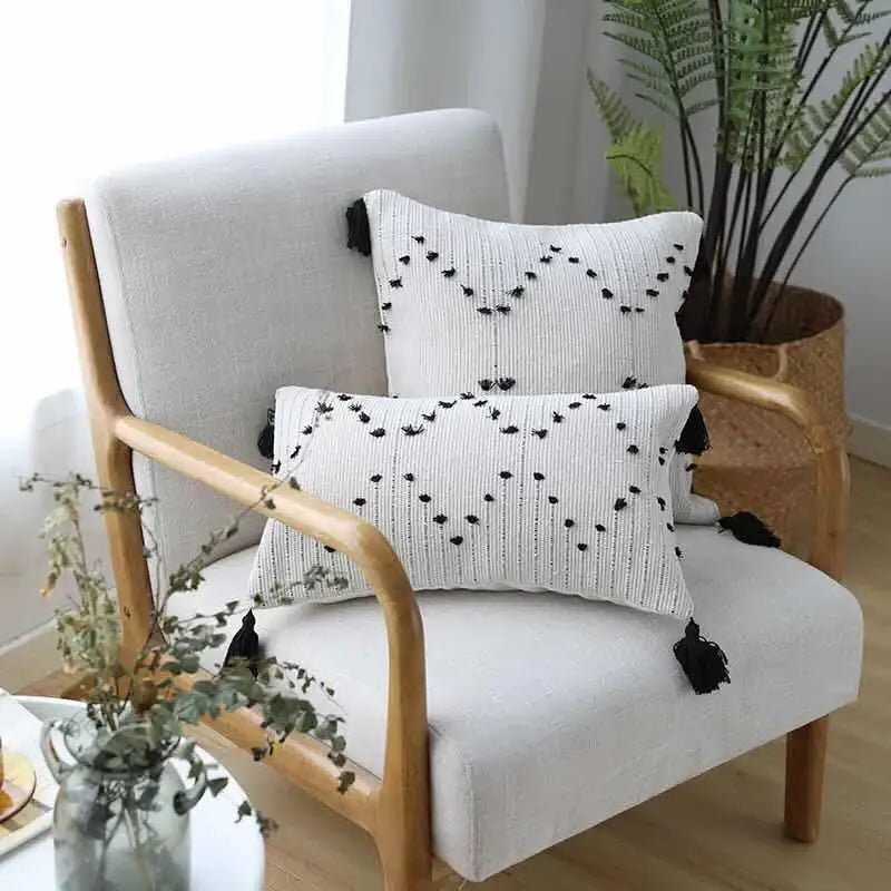 Textured cream cushion cover with black embroidered dots and decorbites geometric tassels for living room decor