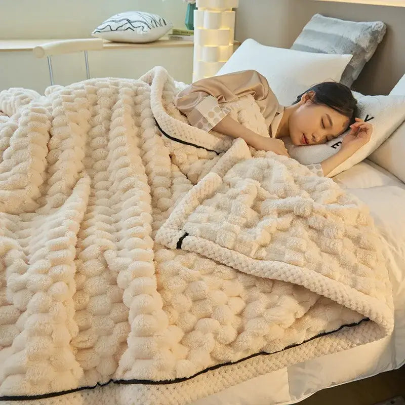Cream coral fleece warm blanket with plush knit texture, chunky cable pattern, and black trim by decorbites